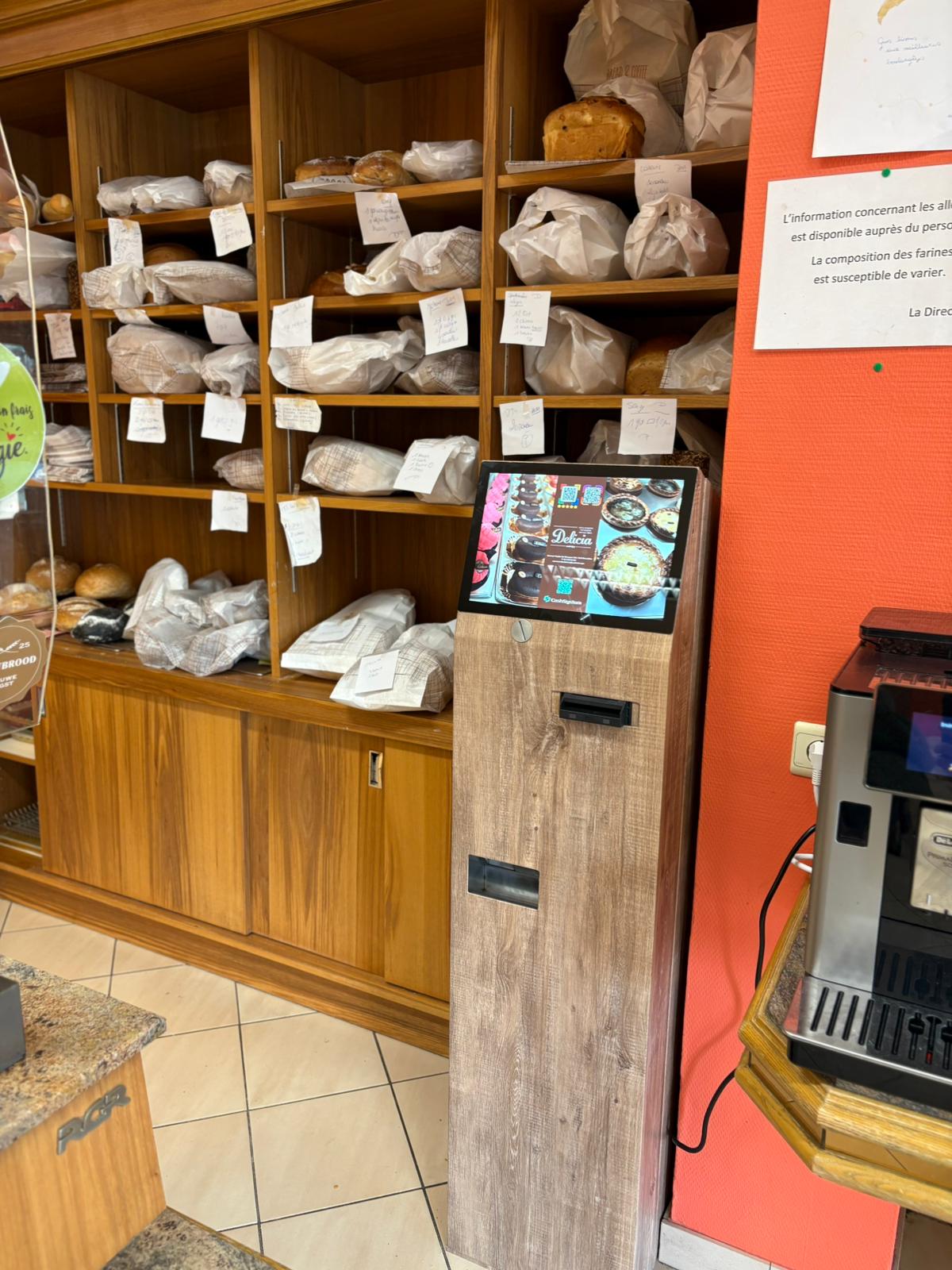 Caisse automatique NewDelicia installée dans une boulangerie en Belgique