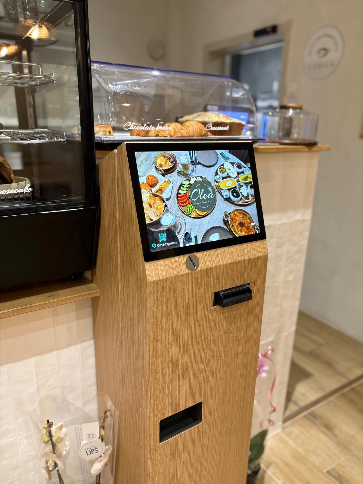 Monnayeur automatique Olea Zaventem — intégration commerce