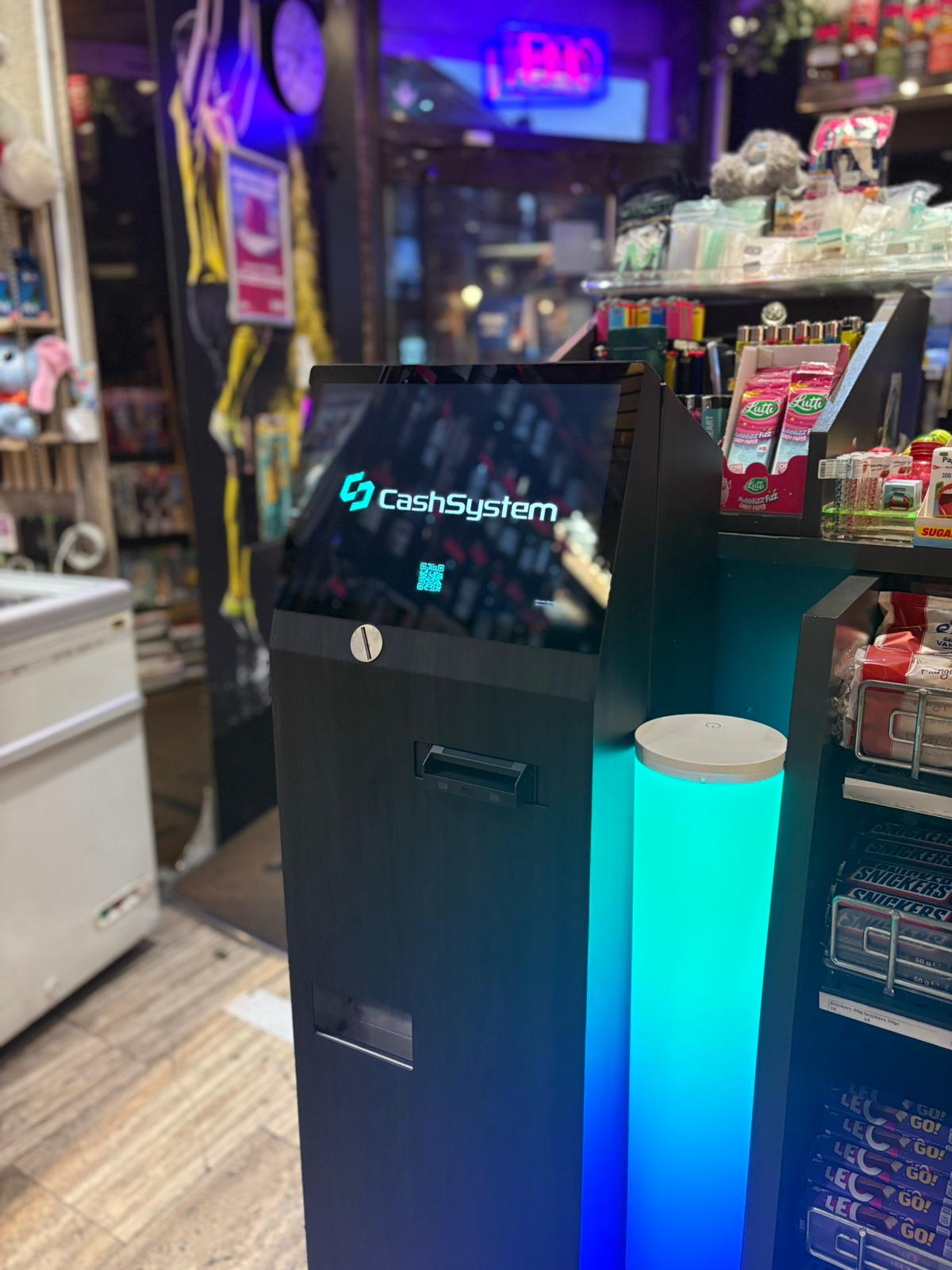 Monnayeur automatique CashSystem OneNight — kiosque noir avec LED cyan, night shop Belgique
